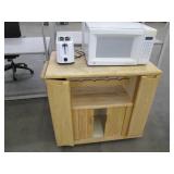 Nice wood kitchen cart with a microwave and toaster