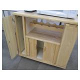 Nice wood kitchen cart with a microwave and toaster