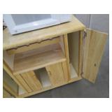 Nice wood kitchen cart with a microwave and toaster