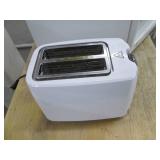 Nice wood kitchen cart with a microwave and toaster