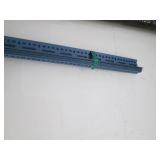 Disassembled shelving unit, includes shelves and hardware