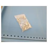 Disassembled shelving unit, includes shelves and hardware