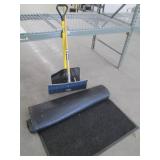 Shovels and a commercial rug in good condition