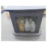 Cart on wheels with assorted commercial supplies