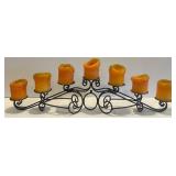 Ornate Black Metal Candelabra with 7 Candle Holders and Orange Candles Ornate Black Metal Candelabra with 7 Candle Holders and Orange Candles