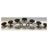Ornate Black Metal Candelabra with 7 Candle Holders and Orange Candles Ornate Black Metal Candelabra with 7 Candle Holders and Orange Candles