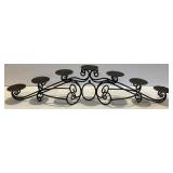 Ornate Black Metal Candelabra with 7 Candle Holders and Orange Candles Ornate Black Metal Candelabra with 7 Candle Holders and Orange Candles