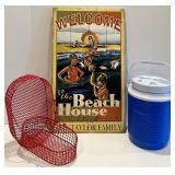 Beach-Themed Decor with Cooler and Red Baskets Beach-Themed Decor with Cooler and Red Baskets