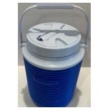 Beach-Themed Decor with Cooler and Red Baskets Beach-Themed Decor with Cooler and Red Baskets