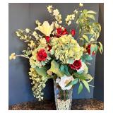 Elegant Floral Arrangement in Glass Vase with Decorative Stones Elegant Floral Arrangement in Glass Vase with Decorative Stones