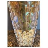 Elegant Floral Arrangement in Glass Vase with Decorative Stones Elegant Floral Arrangement in Glass Vase with Decorative Stones