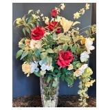 Elegant Floral Arrangement in Glass Vase with Decorative Stones Elegant Floral Arrangement in Glass Vase with Decorative Stones