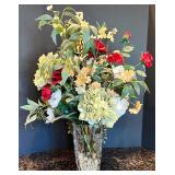 Elegant Floral Arrangement in Glass Vase with Decorative Stones Elegant Floral Arrangement in Glass Vase with Decorative Stones
