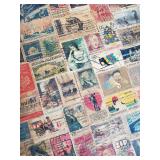 Check This Piece of Art out, Vintage Chair Covered in Vintage Stamps of all types, Sizes and Years   This is a Cool Chair