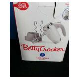 Betty Crocker 7-Speed Power Up Hand Mixer with Stand. Betty Crocker 7-Speed Power Up Hand Mixer with Stand.