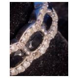 Rhodium Over Sterling Silver 5mm x 3mm Oval Black Onyx and Lab-Created White Sapphire Accent Ring Rhodium Over Sterling Silver 5mm x 3mm Oval Black Onyx and Lab-Created White Sapphire Accent Ring