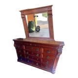 Elegant Wooden Dresser with Ornate Mirror