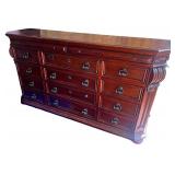 Elegant Wooden Dresser with Ornate Mirror