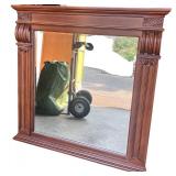 Elegant Wooden Dresser with Ornate Mirror