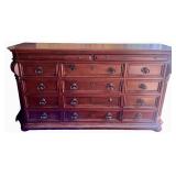 Elegant Wooden Dresser with Ornate Mirror