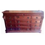 Elegant Wooden Dresser with Ornate Mirror