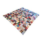 Vintage Patchwork Quilt with Colorful Fabric Squares