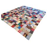 Vintage Patchwork Quilt with Colorful Fabric Squares