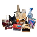 Collection of Laundry and Cleaning Essentials with Iron and Ironing Board