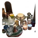 Collection of Home Decor Items Including Candles, Glassware, and Picture Frames