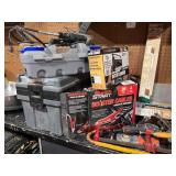 Assorted Garage and Workshop Tool Collection with Clamps, Booster Cables, and Storage Bins