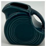 5 piece assorted Fiestaware set including creamer and sugar with tray, small jar and pitcher