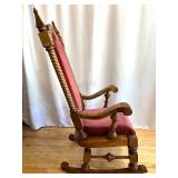 Antique Wooden Rocking Chair with Red Upholstered Cushion