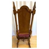 Antique Wooden Rocking Chair with Red Upholstered Cushion