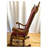 Antique Wooden Rocking Chair with Red Upholstered Cushion