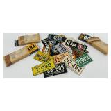 Collection of Vintage Mini Bicycle License Plates from Various States and Years