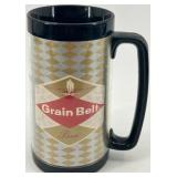 Assorted Collectible Items: Cherub Bookend, Grain Belt Beer Mug, and More