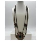 Vintage Ornate Necklace with Green Jewels and Bronze Filigree Design