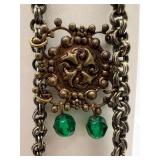 Vintage Ornate Necklace with Green Jewels and Bronze Filigree Design