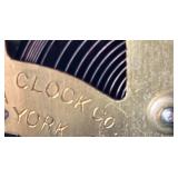 Antique Mantel Clock with Roman Numerals and Ornate Columns