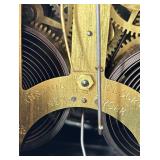 Antique Mantel Clock with Roman Numerals and Ornate Columns