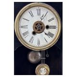 Antique Wooden Mantel Clock with Intricate Carvings