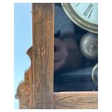 Antique Wooden Mantel Clock with Intricate Carvings