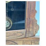 Antique Wooden Mantel Clock with Intricate Carvings