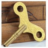 Antique Wooden Mantel Clock with Intricate Carvings