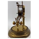 Antique Brass Glass Dome Clock with Rotating Pendulum