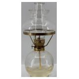 Collection of Vintage Oil Lamps with Glass Chimneys and Accessories