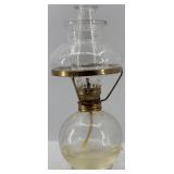 Collection of Vintage Oil Lamps with Glass Chimneys and Accessories