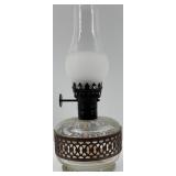 Collection of Vintage Oil Lamps with Glass Chimneys and Accessories