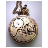 Fred J. Westby Gold Filled Pocket Watch with Chain and Exposed Movement