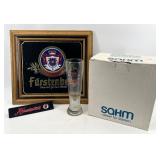 Beer Advertising Collection with Furstenberg Wall Art, Paulaner Weissbier Glasses, and Hauenstein Tap Handle